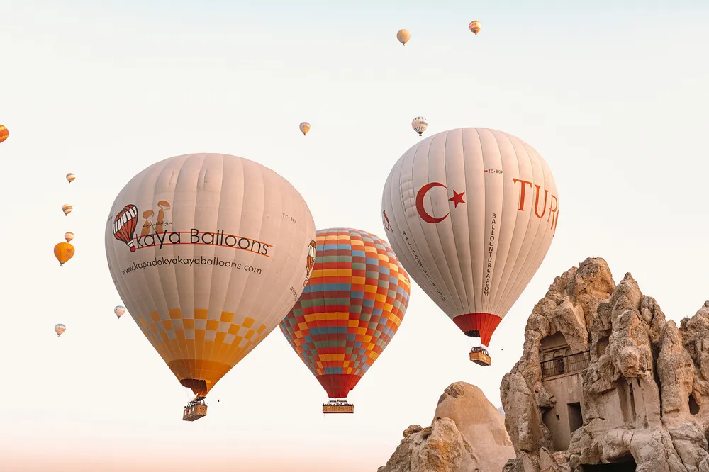 Golden sunrise light over the Cappadocia valleys